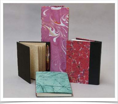 Selection of hard and soft cover blank journals