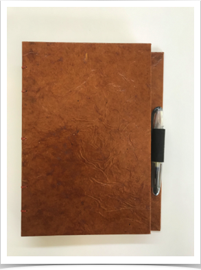 Closed Journal with Pen