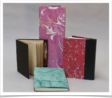 Selection of hard and soft cover blank journals
